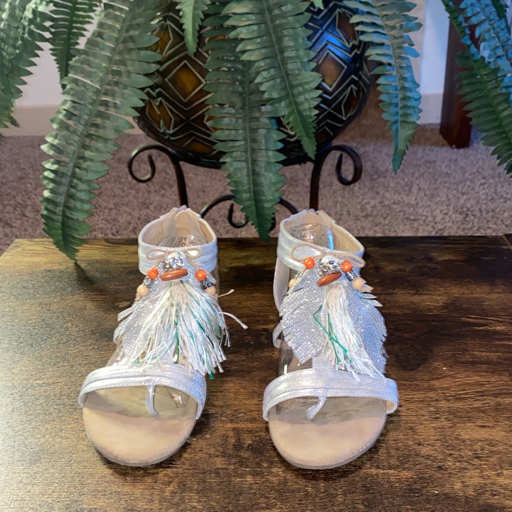 Beautiful bedazzled, feather, tassled sandals!